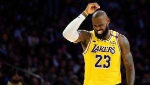 Los Angeles Lakers forward LeBron James (23) reacts after getting hit in the head during the second half of an NBA basketball game against the Charlotte Hornets, Wednesday, Feb. 19, 2025, in Los Angeles. (William Liang/AP)