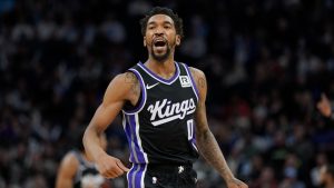 Sacramento Kings guard Malik Monk celebrates after making a basket during the second half of an NBA basketball game against the Minnesota Timberwolves, Monday, Feb. 3, 2025, in Minneapolis. (Abbie Parr/AP)