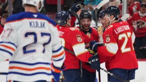 Florida Panthers defenceman Uvis Balinskis (26) celebrates a goal with teammates during the first period of an NHL hockey game against the Edmonton Oilers, Thursday, Feb. 27, 2025, in Sunrise, Fla. (Jim Rassol/AP Photo)