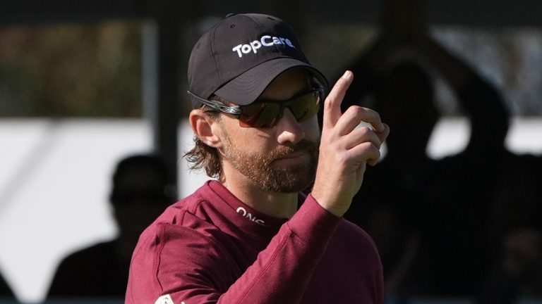 Patrick Rodgers reacts after making a birdie on the 17th hole of the South Course at Torrey Pines during the third round of the Genesis Invitational golf tournament Saturday, Feb. 15, 2025, in San Diego. (Gregory Bull/AP Photo)