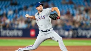 Texas Rangers starting pitcher Max Scherzer (31) works against the Toronto Blue Jays during third inning American League MLB baseball action. (Spencer Colby/THE CANADIAN PRESS)