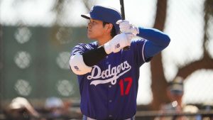 Los Angeles Dodgers two-way player Shohei Ohtani works out during a spring training baseball practice, Wednesday, Feb. 26, 2025, in Phoenix. (Ashley Landis/AP)