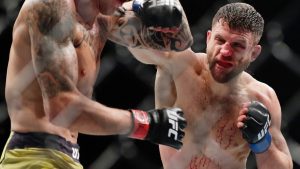 Calvin Kattar throws a punch during the third round of a featherweight UFC bout. (Frank Franklin II/AP)