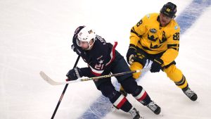 United States' Dylan Larkin, left, controls the puck against Sweden's William Nylander during the first period of a 4 Nations Face-Off hockey game, Monday, Feb. 17, 2025, in Boston. (Charles Krupa/AP Photo)