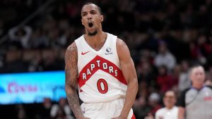 Toronto Raptors guard A.J. Lawson (0) celebrates his career high after sinking a three-point shot during second half NBA basketball action. (Nathan Denette/CP)