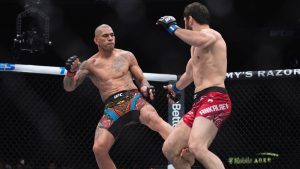 Alex Pereira kicks Magomed Ankalaev during a UFC 313 mixed martial arts light heavyweight title bout in Las Vegas. (John Locher/AP)