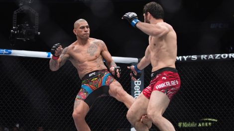 Alex-Pereira-kicks-Magomed-Ankalaev-during-a-UFC-313-mixed-martial-arts-light-heavyweight-title-bout-in-Las-Vegas