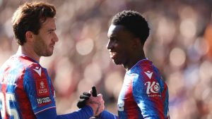 Crystal Palace's Eddie Nketiah, right, celebrates with Crystal Palace's Ben Chilwell after scoring his side's third goal during the English FA Cup soccer match between Crystal Palace and Millwall at Selhurst Park, London, England, Saturday, March 1, 2025. (Ian Walton/AP)