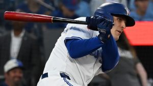 Toronto Blue Jays right fielder Daulton Varsho hits a single against the New York Mets during first inning MLB action in Toronto on Tuesday Sept. 10, 2024. (THE CANADIAN PRESS/Jon Blacker)