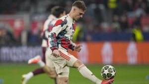 Bayern's Joshua Kimmich controls the ball during warm up before the Champions League round of 16 second leg match between Bayer Leverkusen and Bayern Munich at the BayArena in Leverkusen, Germany, Tuesday, March 11, 2025. (AP/Martin Meissner)