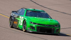 Katherine Legge drives around Turn 4 during a NASCAR Cup Series auto race at Phoenix Raceway, Sunday, March 9, 2025, in Avondale, Ariz. (AP Photo/Darryl Webb)