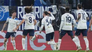 Lazio's Alessio Romagnoli, left, celebrates with teammates after scoring his side's first goal during the Serie A soccer match between Lazio and Udinese. (Alfredo Falcone/LaPresse via AP)