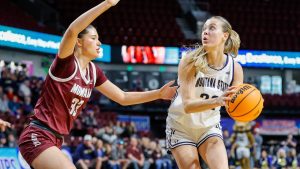 Montana State forward Marah Dykstra (32) looks to the basket while being defended by Montana guard Adria Lincoln (33) during an NCAA college basketball game in the championship of the Big Sky tournament, Wednesday, March 12, 2025, in Boise, Idaho. (Steve Conner/AP)