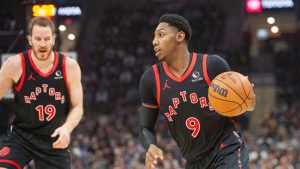 Toronto Raptors' RJ Barrett (9) drives to the basket as Jakob Poeltl (19) looks on during the first half of an NBA basketball game against the Cleveland Cavaliers in Cleveland, Sunday, Nov 24, 2024. (Phil Long/AP)