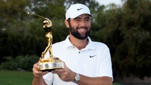 Scottie Scheffler holds up the trophy after winning The Players Championship golf tournament Sunday, March 17, 2024, in Ponte Vedra Beach, Fla. (Lynne Sladky/AP)