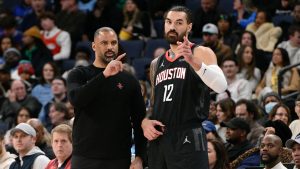 Houston Rockets head coach Ime Udoka, left, talks with center Steven Adams (12) in the first half of an NBA basketball game against the Memphis Grizzlies, Thursday, Jan. 9, 2025, in Memphis, Tenn. (Brandon Dill/AP)