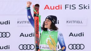 Italy's Federica Brignone celebrates on the podium after winning an alpine ski, women's World Cup super G, in Kvitfjell, Norway, Sunday, March 2, 2025. (Marco Trovati/AP)