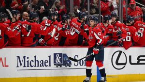 Washington Capitals defenceman Martin Fehervary (42) celebrates with teammates after scoring during the second period of an NHL hockey game against the Seattle Kraken, Sunday, March 9, 2025, in Washington. (Terrance Williams/AP)