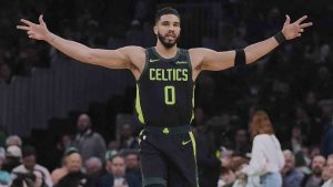 Boston Celtics forward Jayson Tatum (0) celebrates after a 3-pointer against the Philadelphia 76ers during the first half of an NBA basketball game, Thursday, March 6, 2025, in Boston. (Charles Krupa/AP)