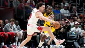 Chicago Bulls guard Josh Giddey, left, drives as Indiana Pacers forward Aaron Nesmith, right, guards during the second half of an NBA basketball game in Chicago, Monday, March 10, 2025. (Nam Y. Huh/AP)