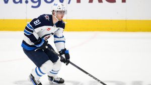 Winnipeg Jets left wing Kyle Connor (81) in action during overtime of an NHL hockey game against the Washington Capitals, Saturday, Feb. 1, 2025, in Washington. (Nick Wass/AP)