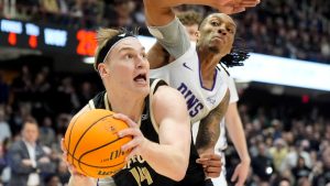 Wofford centre Kyler Filewich drives to the basket past Furman guard PJay Smith Jr. during the first half of an college basketball championship game at the Southern Conference tournament, Monday, March 10, 2025, in Asheville, N.C. (Chris Carlson/AP)