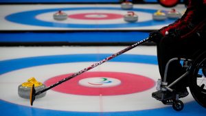 Canada advanced to the playoffs at the word wheelchair curling championship with a 9-3 win over Italy in its final round-robin game Thursday. (Dita Alangkara/CP)